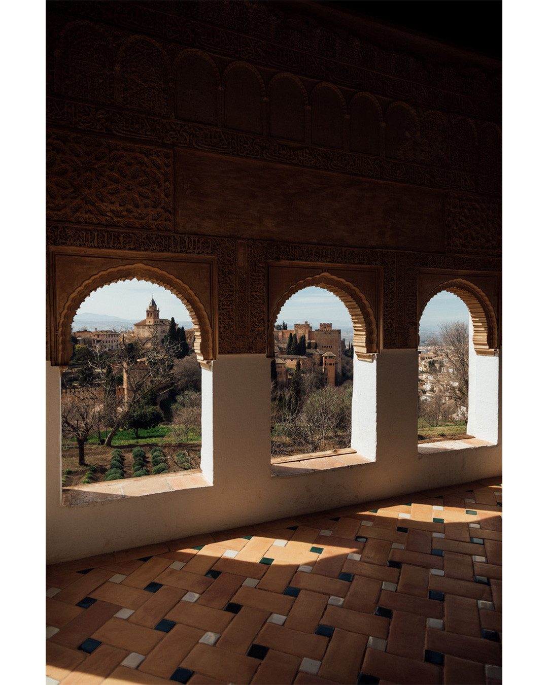 Framed by the arches of the Alhambra, wander through the history and beauty of Granada. ✨